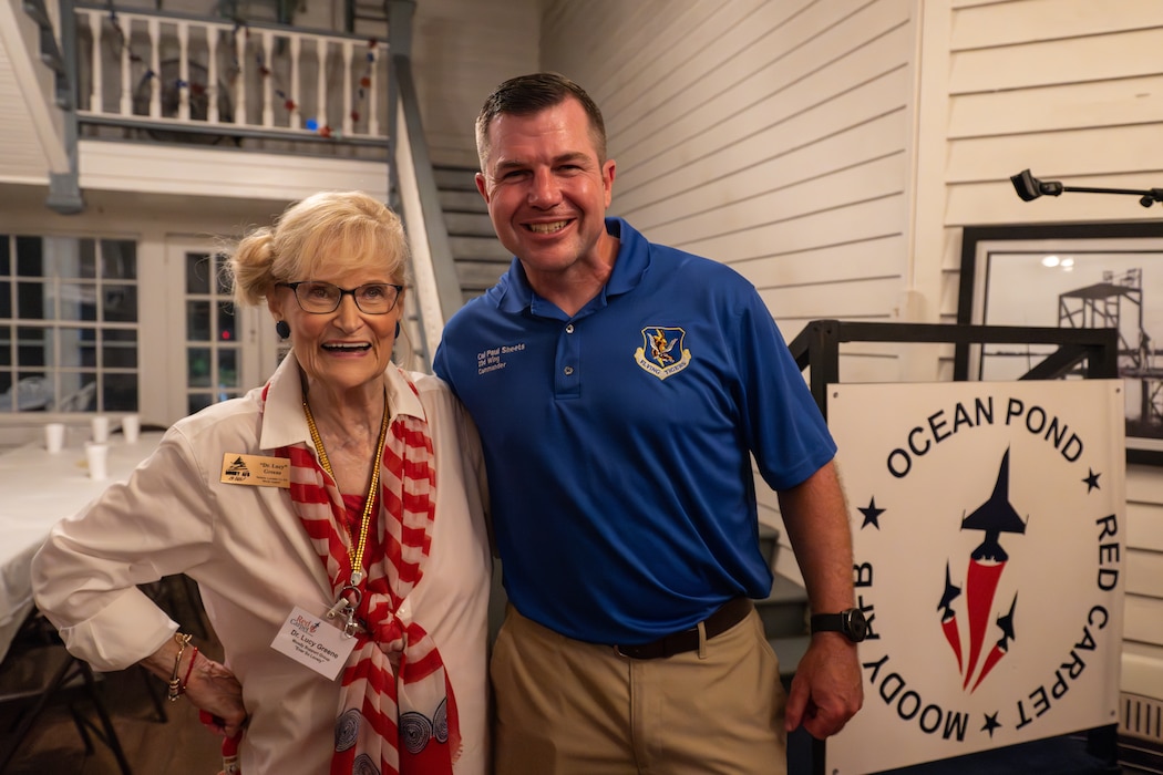 Dr. Lucy is posing with Col. Sheets.