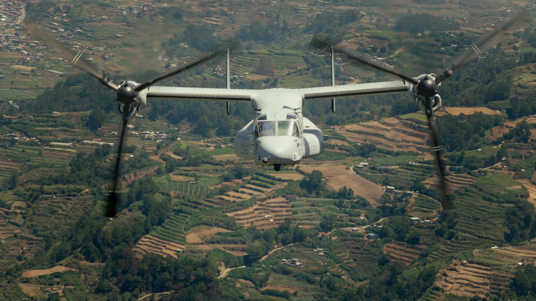 A U.S. Marine Corps MV-22B Osprey, assigned to Marine Medium Tiltrotor Squadron (VMM) 364, Marine Air Group 39, 3rd Marine Aircraft Wing, flies during a simulated tactical recovery of aircraft and personnel during Exercise Balikatan 25 over the South China Sea, April 28, 2025.