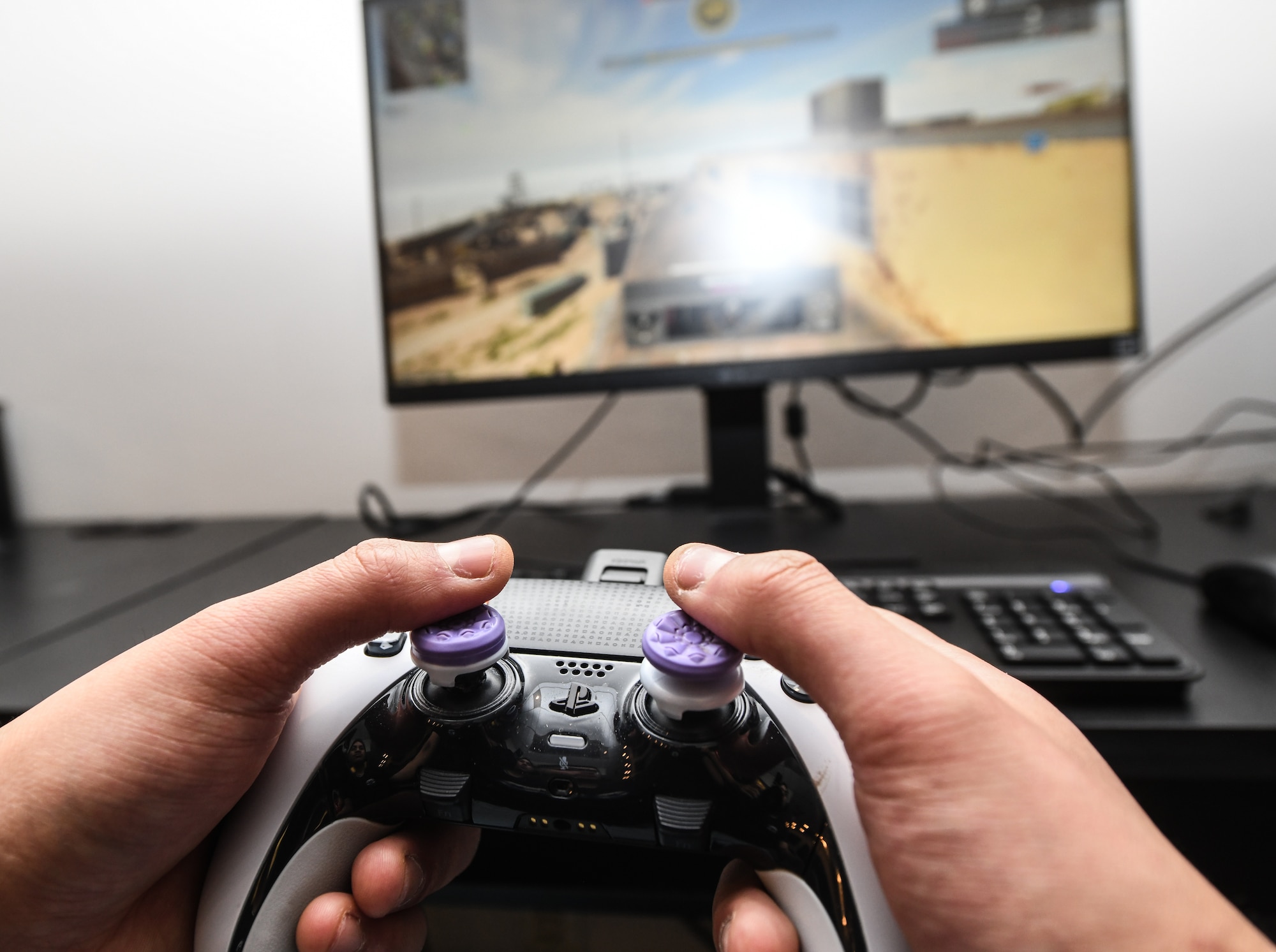 Senior Airman Ryan Ky, 55th Logistics Readiness Squadron, plays Call of Duty at the Offutt Event Center, March 7, 2025. SrA Ky was selected as part of a four person team to represent Offutt Air Force Base in the Air Force Gaming tournament. (U.S. Air Force photo by Chad Watkins)