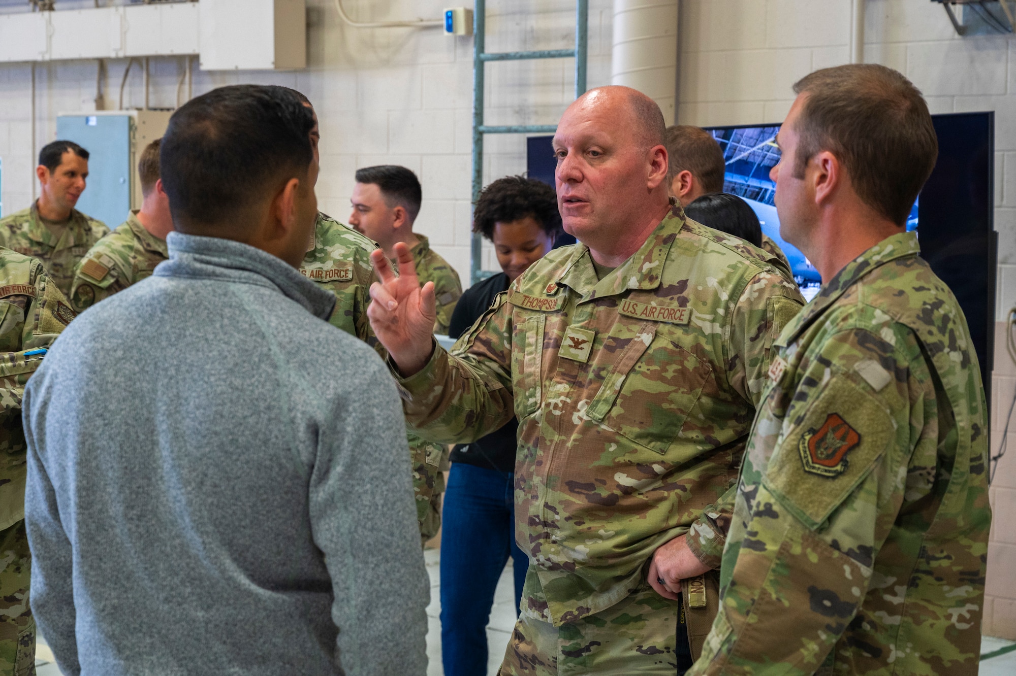 U.S. Air Force Col. Michael Thompson, 62d Maintenance Group commander, speaks to a Skydio Air Force liaison at Joint Base Lewis-McChord, Washington, April 23, 2025.