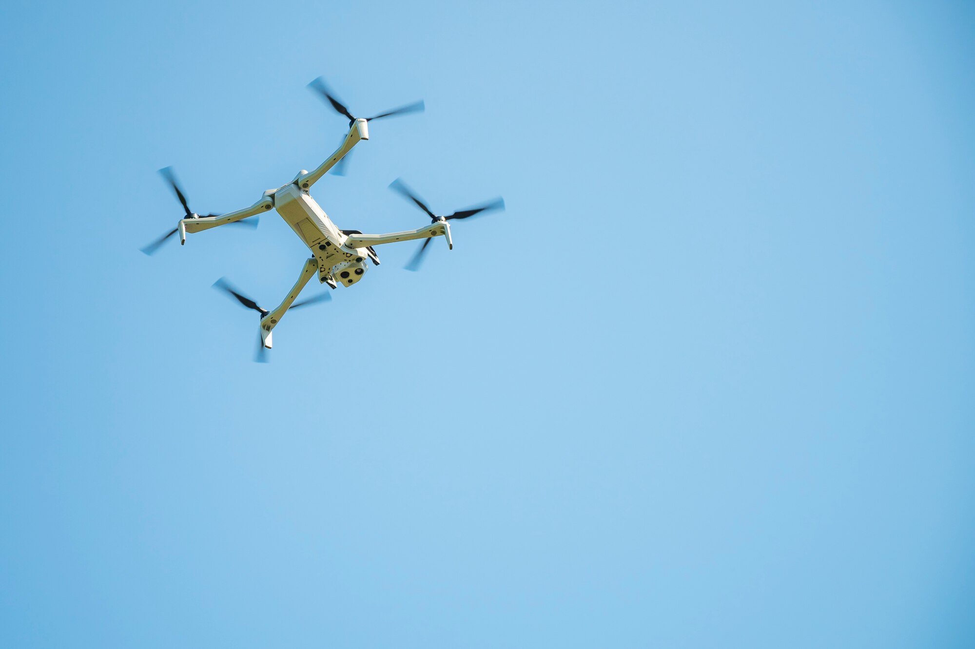 A Skydio X10D drone flies above Airmen during a demonstration at Joint Base Lewis-McChord, Washington, April 23, 2025.