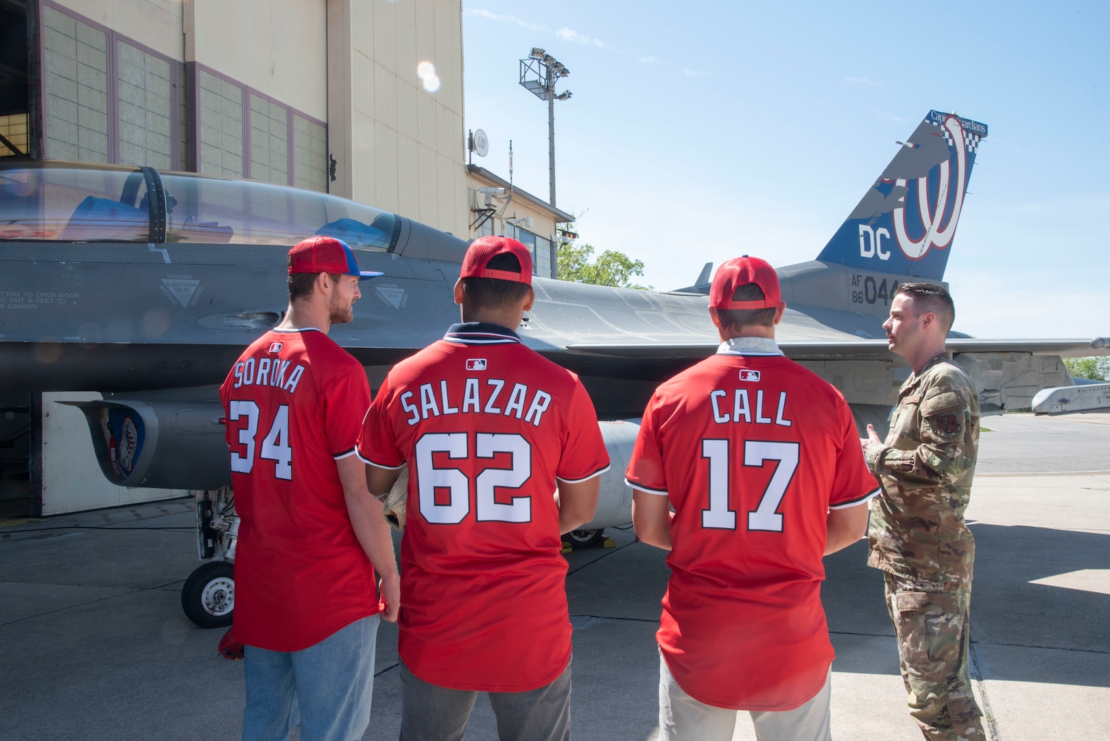 Washington Nationals players Michael Soroka, Eduardo Salazar and Alex Call receive a briefing on the 113th Wing’s mission and the F-16 Fighting Falcon aircraft capabilities from U.S. Air Force Master Sgt. Dalton Yeager, 113th Aircraft Maintenance Squadron, at Joint Base Andrews, Md., April 23, 2025. The players visited the base to gain a better understanding of Andrews’ mission, policies, and programs.