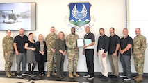 Ogden ALC leadership and Quality Assurance team members pose for a group photo.