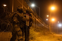 U.S. Soldiers, assigned to Alpha Company, 1st Battalion, 12 Infantry Regiment, enplace signs in order to establish the Texas National Defense Area at El Paso, Texas, (TXNDA) April 30, 2025