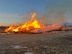 Russian Olive trees are collected into a pile for transportation to a burn pit on Minot Air Force Base, North Dakota, Mar. 7, 2025. The U.S. Air Force Wildland Fire Branch provides strategic, logistical, and “boots on the ground” wildland fire support to ensure military preparedness. (Courtesy photo)