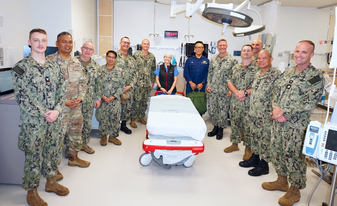 Six Religious Ministry Teams across Guam came together for a Trauma Team Integration Training at U.S. Naval Hospital Guam on April 17, 2025. The training aims to enhance trauma readiness, improve patient care outcomes, and align with the Surgeon General’s 2025 Navy Medicine Campaign Order by integrating religious ministry into trauma response. The training emphasized the spiritual and emotional needs of both patients and medical personnel during trauma events. Chaplains play a crucial role in post-event debriefings by offering emotional support, promoting team cohesion and helping to improve future performance and outcomes.