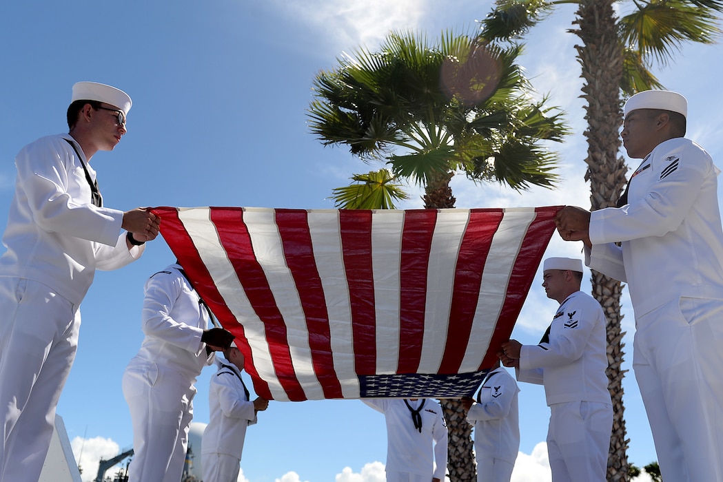 PEARL HARBOR (June 28, 2016) Members of the Joint Base Pearl Harbor-Hickam (JBPHH) Honors and Ceremonial Guard participate in an ash-scattering ceremony for Pearl Harbor Survivor Chief Petty Officer William F. White at the USS Utah Memorial on Ford Island, JBPHH. White's remains joined the remains of more than 50 Sailors still aboard the USS Utah (AG 16) wreckage, which sank during the 1941 attack on Pearl Harbor. (U.S. Navy photo by Mass Communication Specialist 2nd Class Johans Chavarro/Released)