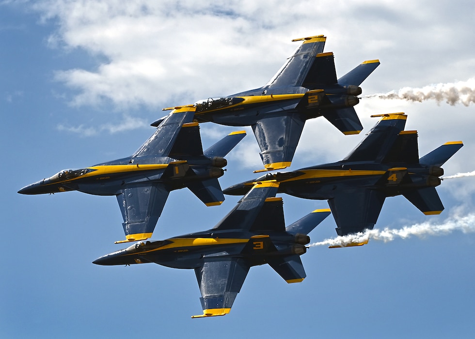 The U.S. Navy Flight Demonstration Team, the Blue Angels, perform in Wichita, Kansas at the Frontiers In Flight Air Show. (U.S. Navy photo by Chief Mass Communication Specialist Michael Russell/Released)