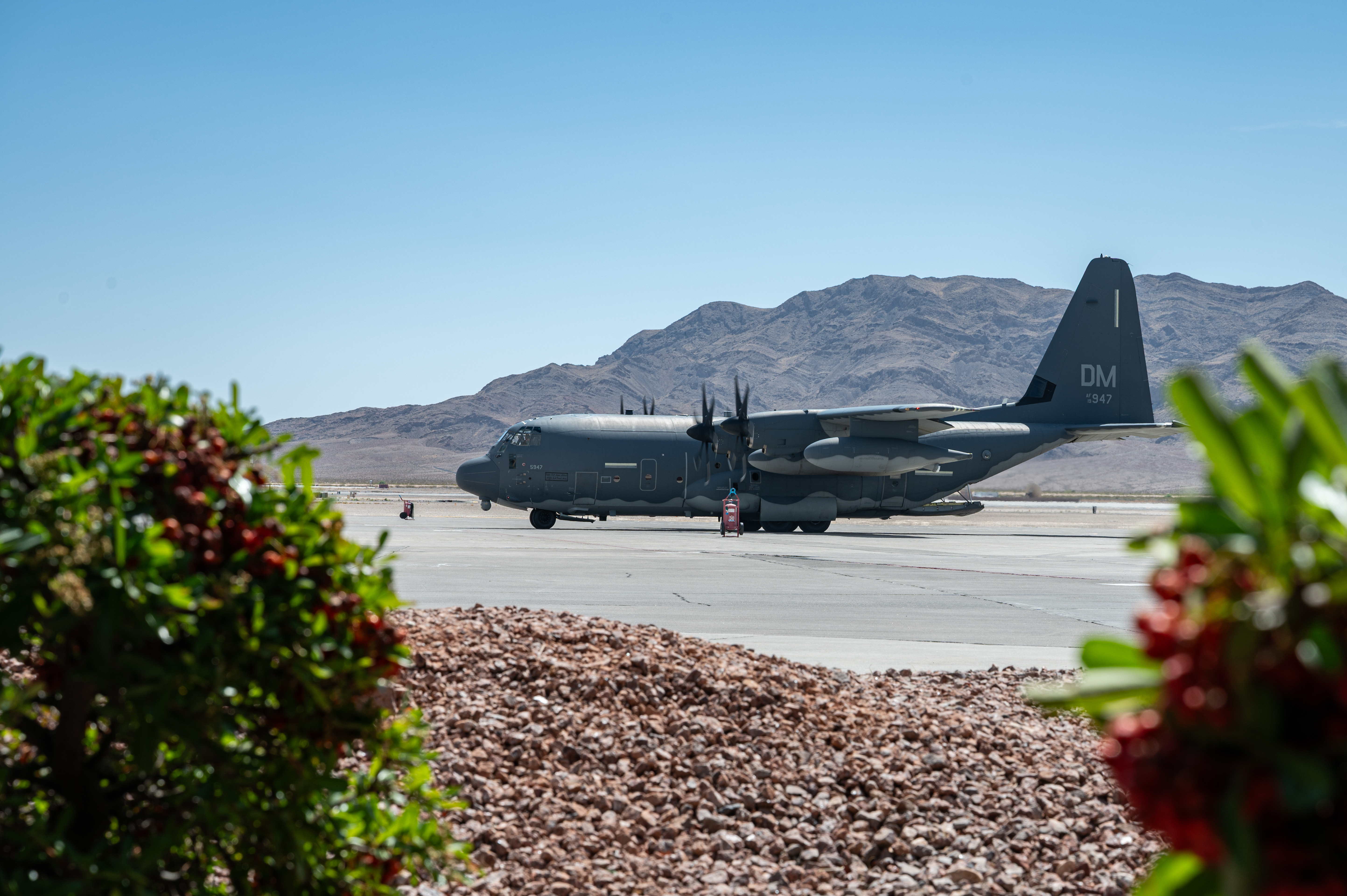 A U.S. Air Force HC-130J, assigned to the 79th Rescue Squadron (RQS), prepares to taxi at Nellis Air Force Base (AFB), Nevada, April 23, 2025. Airmen from the 58th RQS and the 79th RQS worked together to safely deliver the Gentz memorial to Kirtland AFB, New Mexico. (U.S. Air Force Photo by Airman 1st Class Michael Sanders)