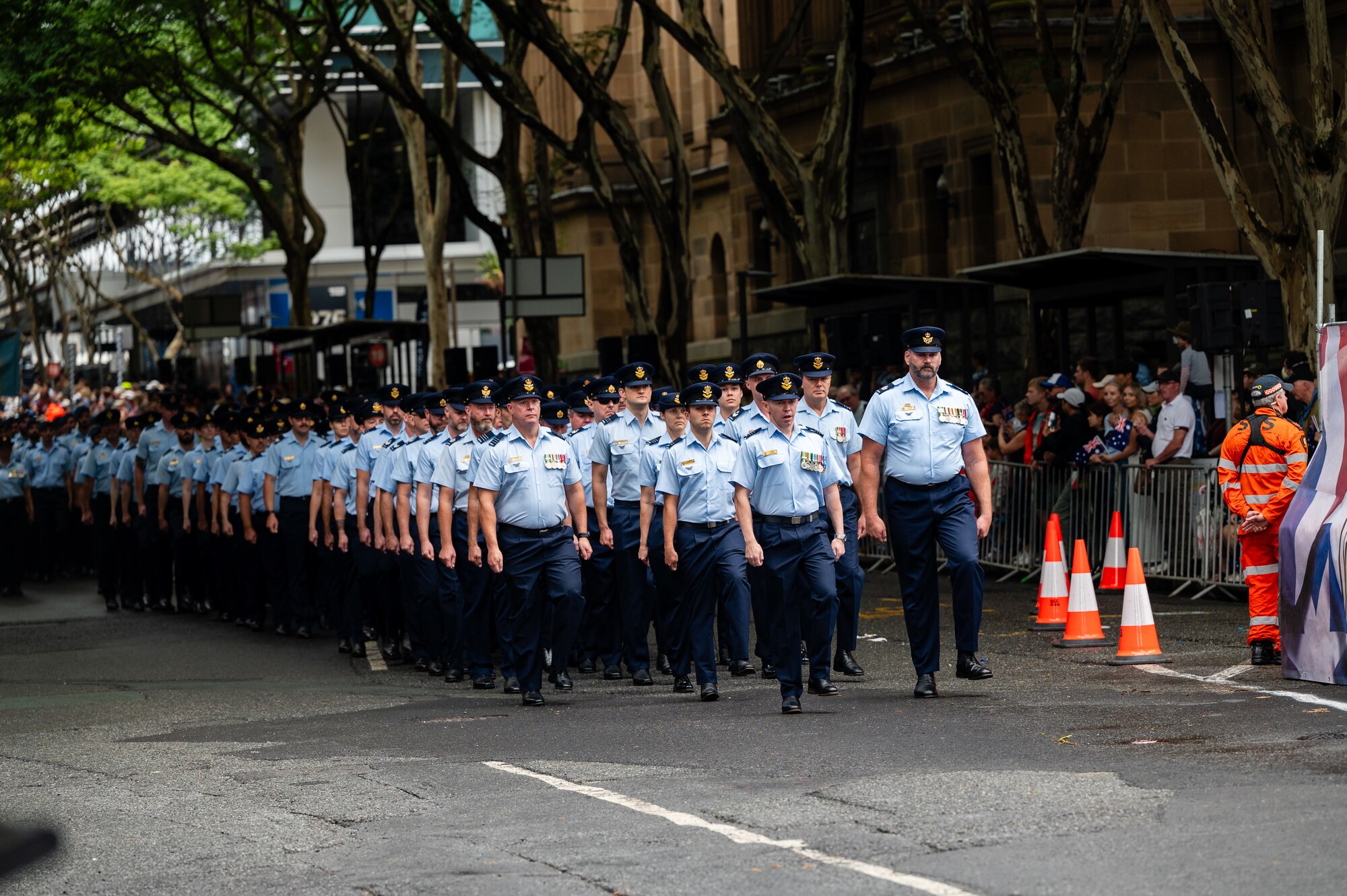 U.S. Air Force Airmen march along side Royal Australian Air Force members during New Zealand Army Corps day in Brisbane.
