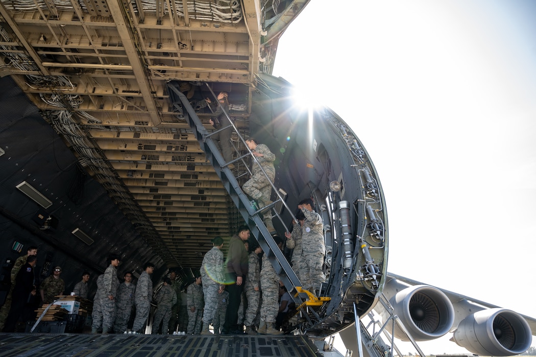 JROTC cadets tour a US Air Force C5