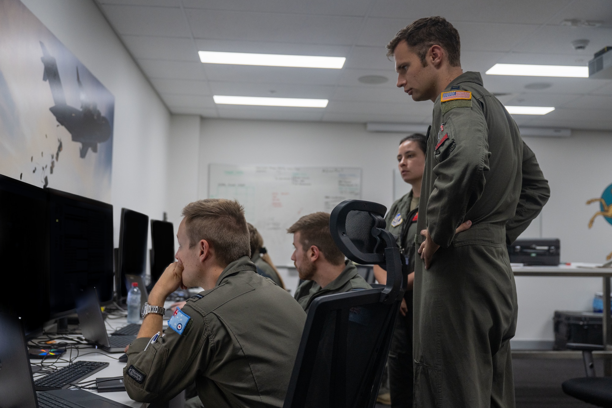 U.S. Air Force pilots use computers to plan out their future operations in Brisbane, Queensland, Australia.
