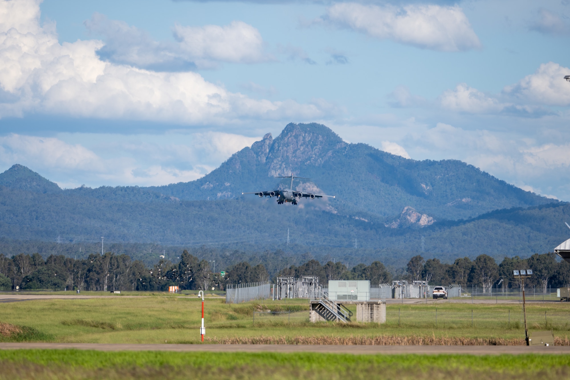 A U.S. Air Force C-17 flies in to land in Brisbane, Queensland, Australia.