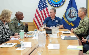 Rear Adm. Stephen Barnett, second from the left, commander, Navy Closure Task Force-Red Hill (NCTF-RH), provides a progress update on the decommissioning of the Red Hill Bulk Fuel Storage Facility (RHBFSF) to Rep. Ed Case on Joint Base Pearl Harbor-Hickam, Hawaii, April 25, 2025. Charged with the safe decommissioning of the facility, NCTF-RH was established by the Department of the Navy as a commitment to the community and the environment. NCTF-RH continues to engage with the people of Hawaii, regulatory agencies, and other stakeholders as it safely and deliberately decommissions the RHBFSF. (U.S. Navy photo by Mass Communication Specialist 1st Class Glenn Slaughter)