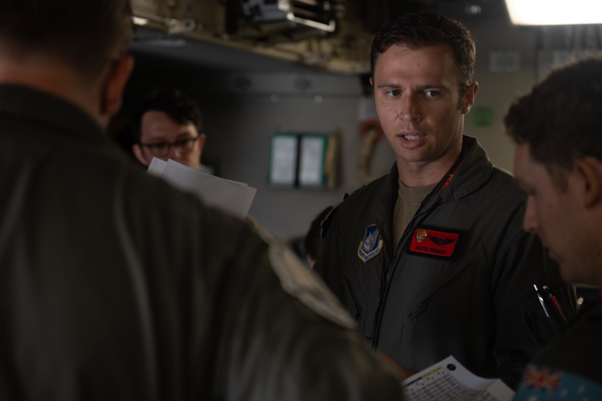 A U.S. Air Force pilot briefs his aircrew prior to take off in the C-17 Globemaster III.