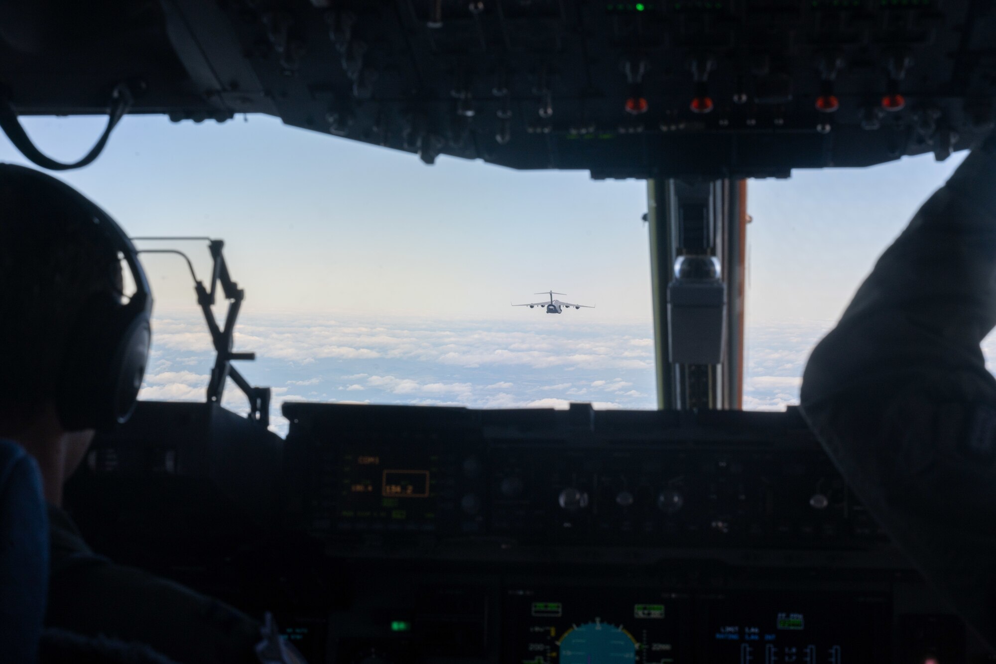 U.S. Air Force C-17 flies over through the sky during Global Dexterity 25.