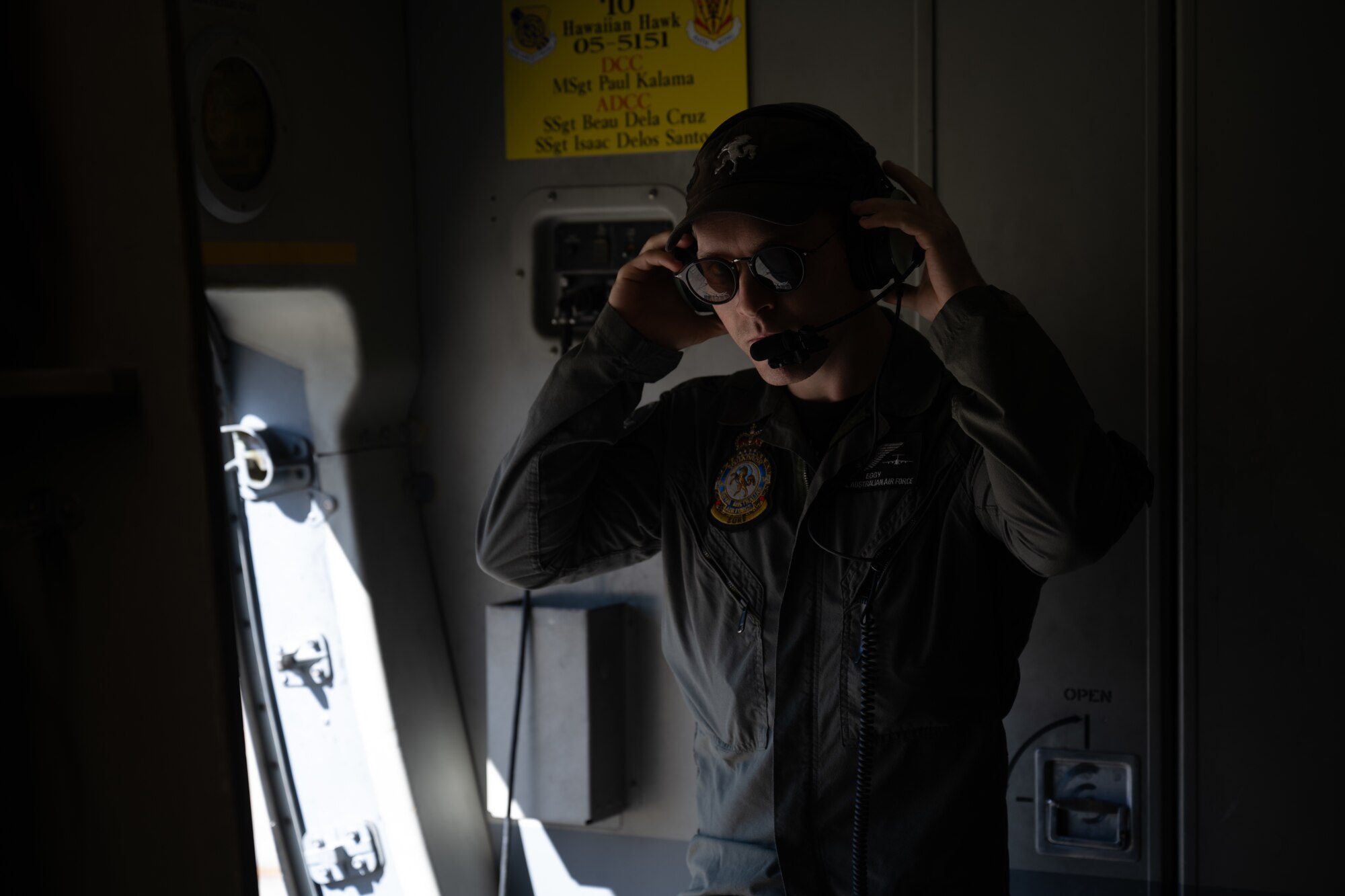 U.S. Air Force aircrew member prepares for a flight over Australia.
