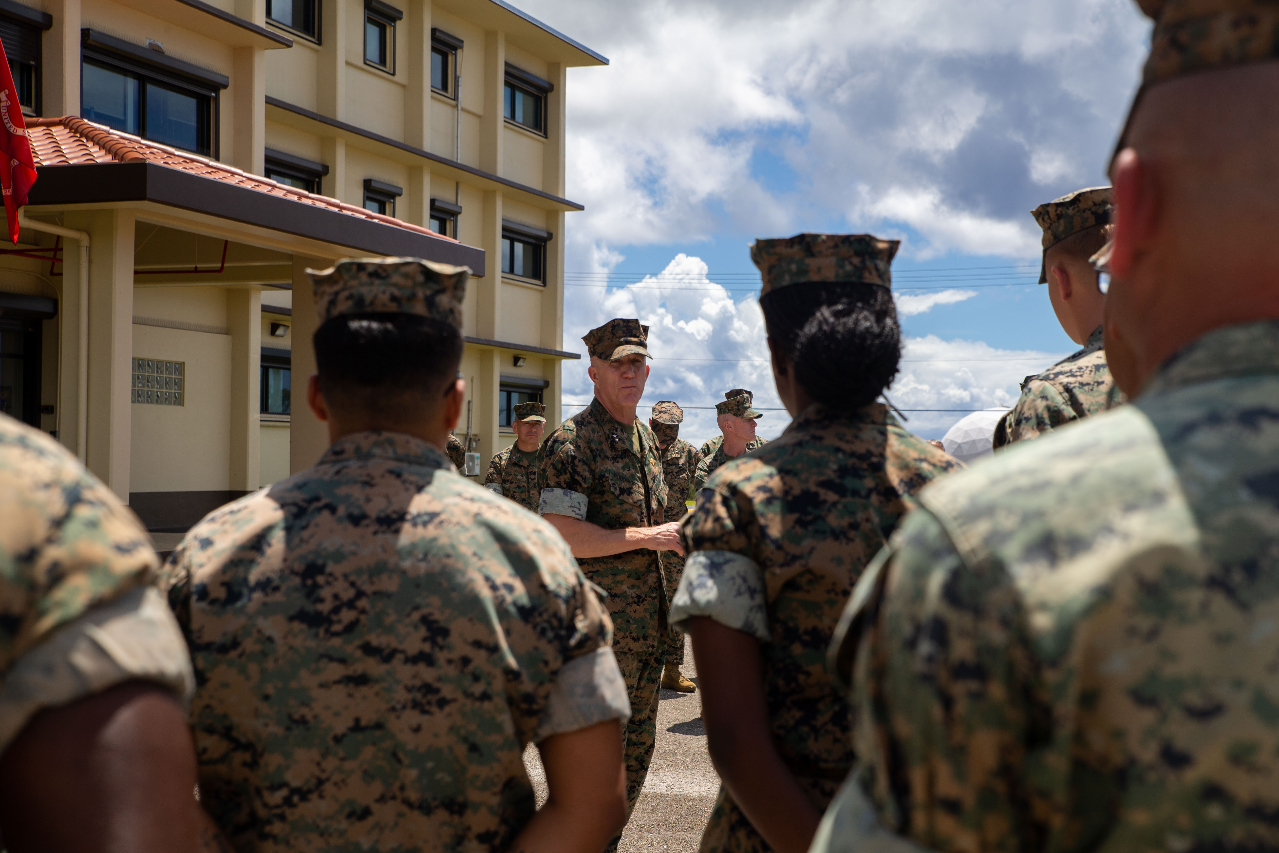 U.S. Marine Corps Maj. Gen. Jason Woodworth, commander of Marine Corps Installations Command and Assistant Deputy Commandant, Installations and Logistics Facilities, speaks to the Marines and Sailors at Marine Corps Base Camp Blaz, Guam, April 23, 2025. Woodworth and his staff visited Camp Blaz to see the progression of the base’s development and capabilities. (U.S. Marine Corps photo by Lance Cpl. Afton Smiley)