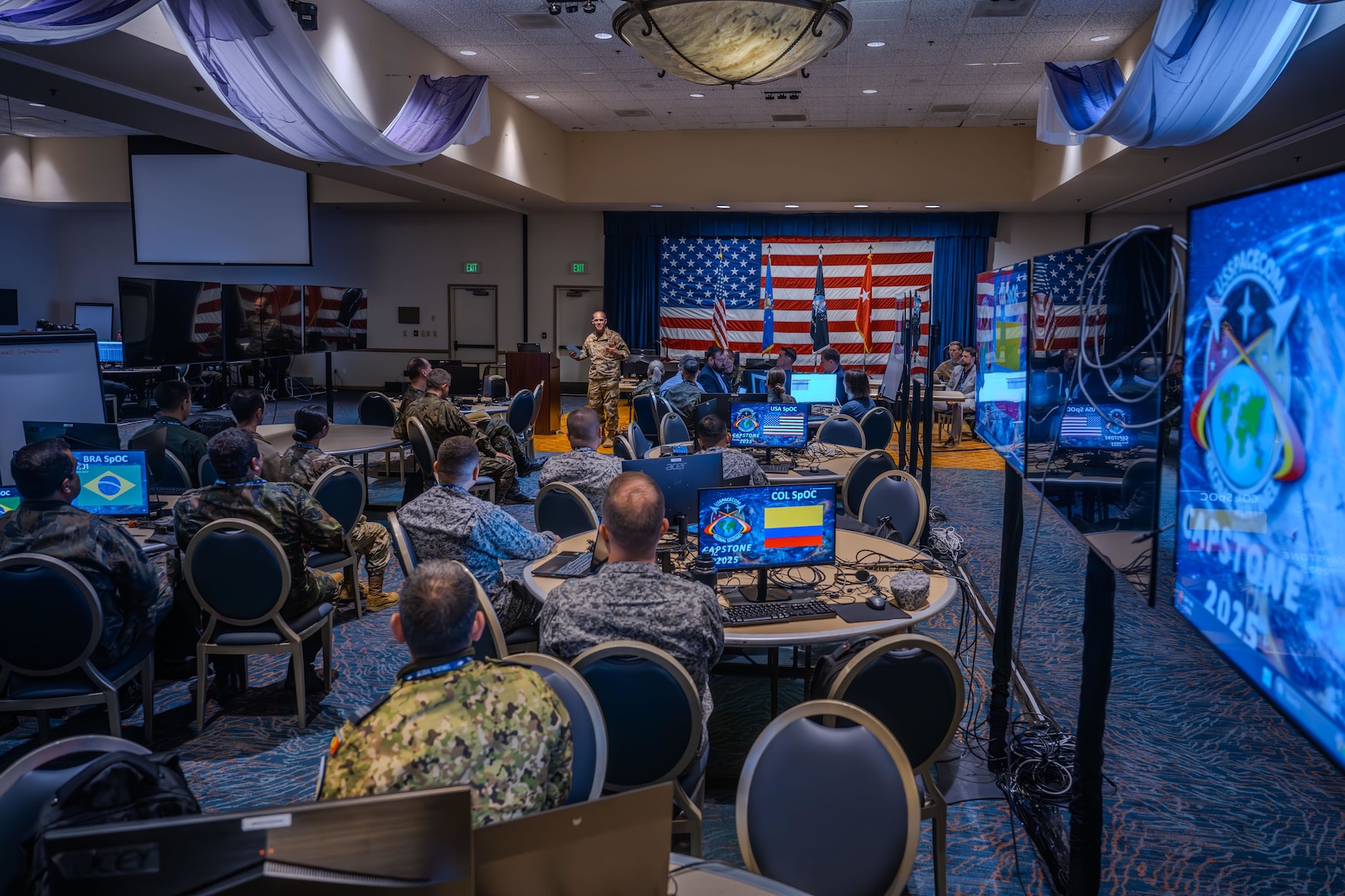 Space operators sit at computer workstations