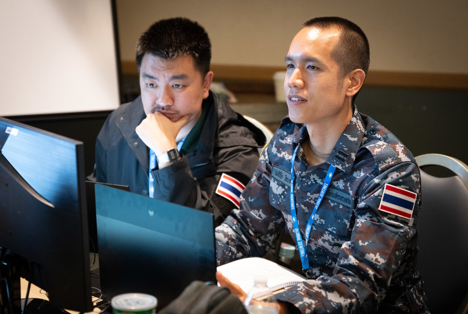 Space operators sit at computer workstations
