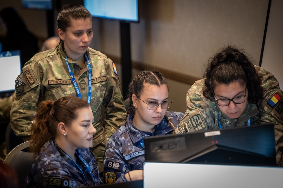 Space operators sit at computer workstations