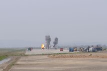 U.S. Airmen assigned to the 51st Civil Engineer Squadron explosive ordnance disposal flight set off several explosions on a controlled airfield pad in preparation for the first complex, joint and combined IRON RADR exercise at Osan Air Base, Republic of Korea, April 18, 2025. Rapid airfield damage repair is a process for repairing structural damage on airfields to restore combat airpower generation. The contributions of the EOD Airmen enhanced the realism and complexity of IRON RADR. (U.S. Air Force photo by Staff Sgt. Kahdija Slaughter)