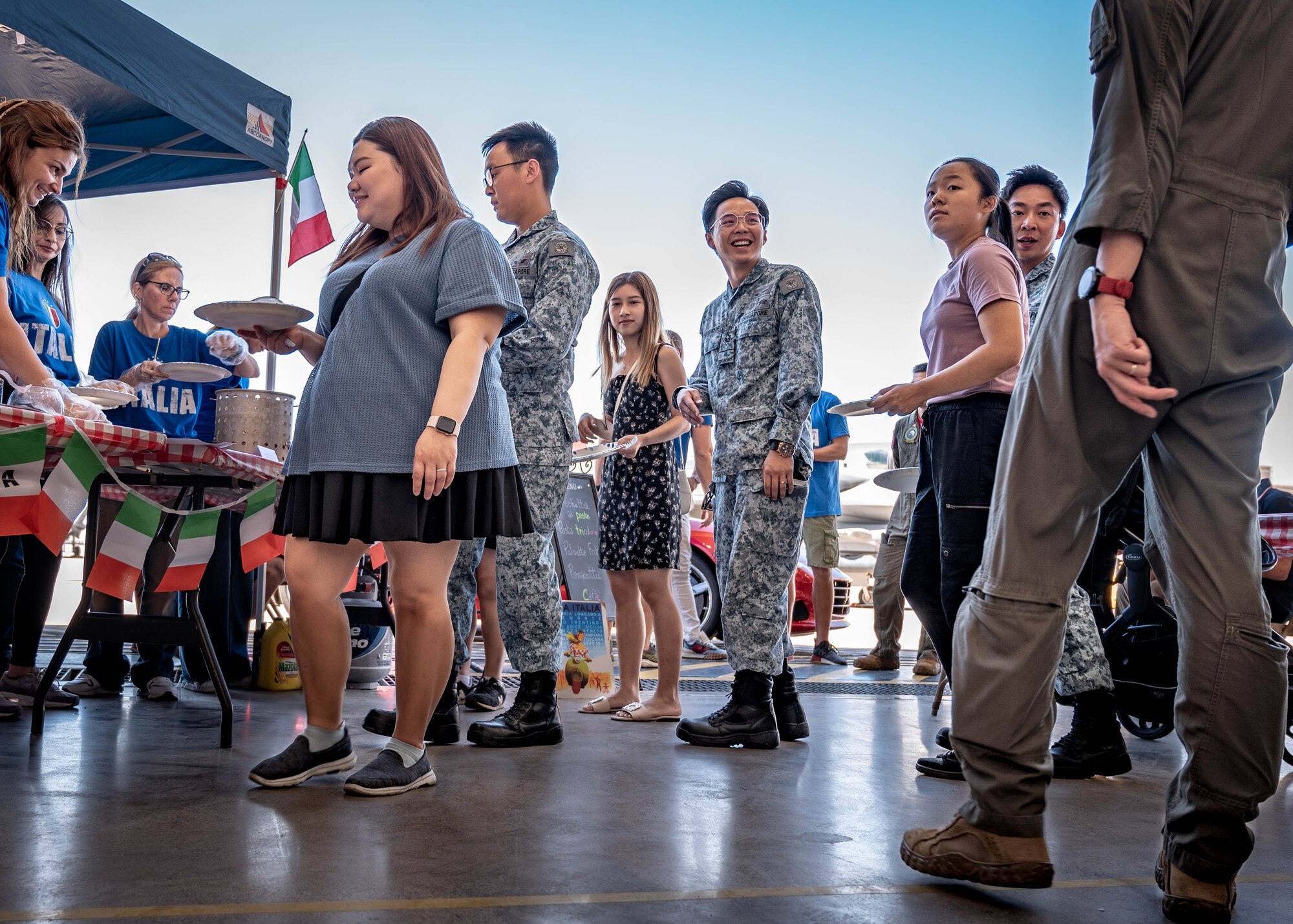 Singaporean guests gather at the Italian display during Allies and Partners Day