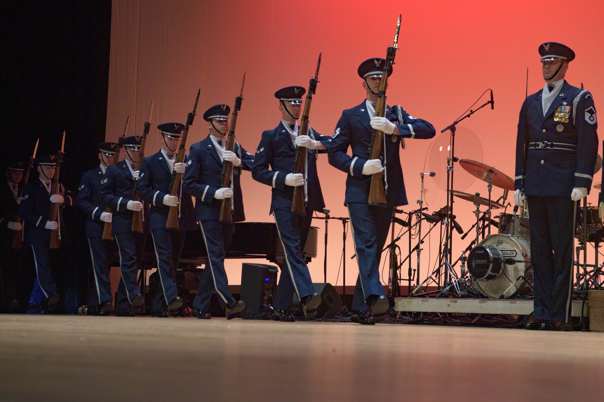 A group of drill team members perform.