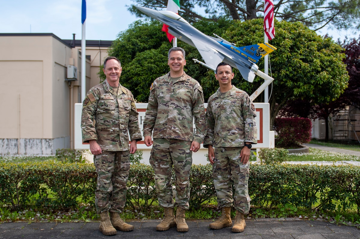 Three men standing together