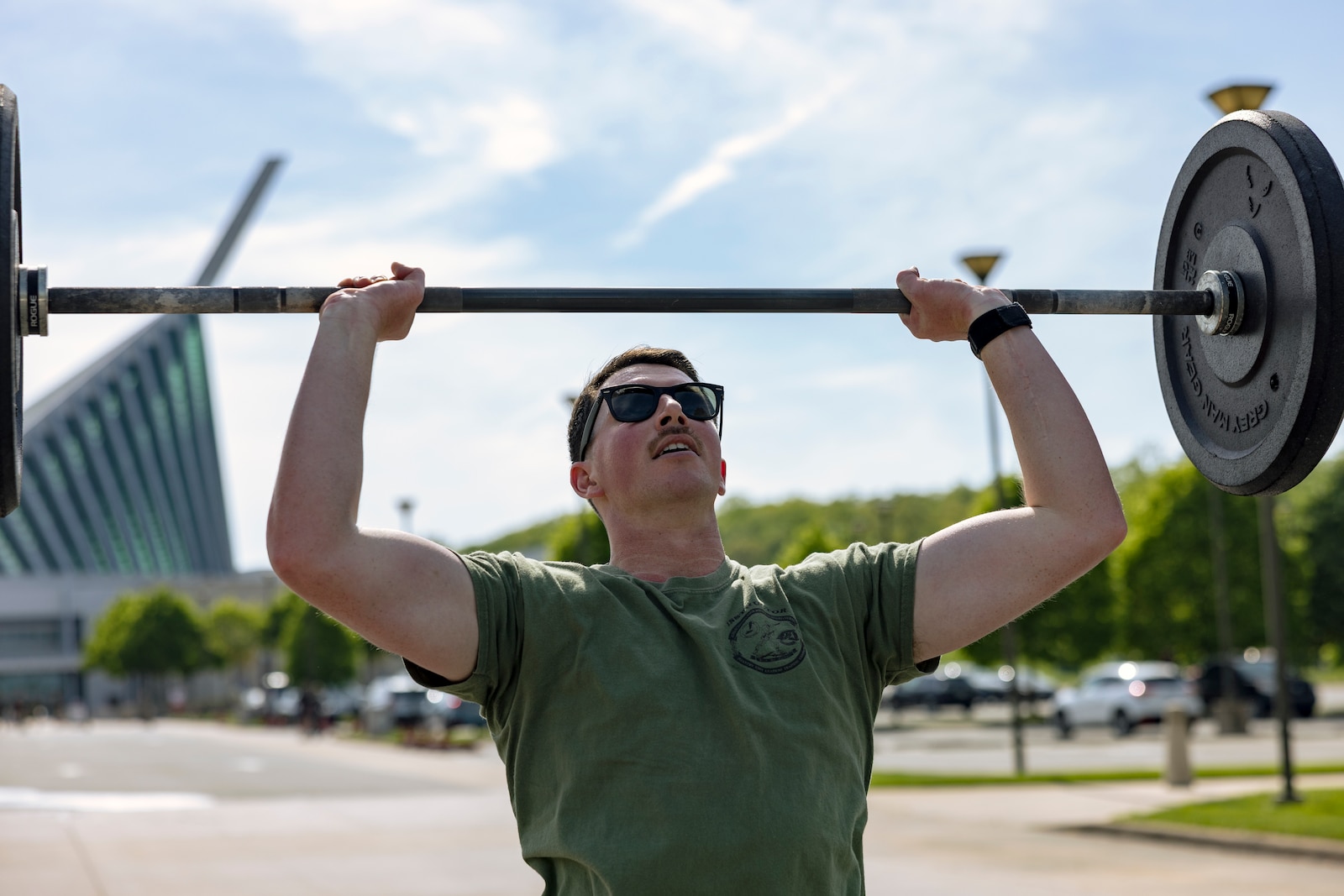 U.S. Marine Corps Staff Sgt. Ryan Salvato conducts the 22 a Day thruster and run exercise during the Training Command’s Fittest Instructor Competition at the National Museum of the Marine Corps, Triangle, Virginia, April 24, 2025. The Fittest Instructor Competition determines which Marine is the most fit across the major support elements of Training Command while supplementing those competitors with increased education in aerobics, nutrition, and exercise.  (U.S. Marine Corps photo by James Frank)