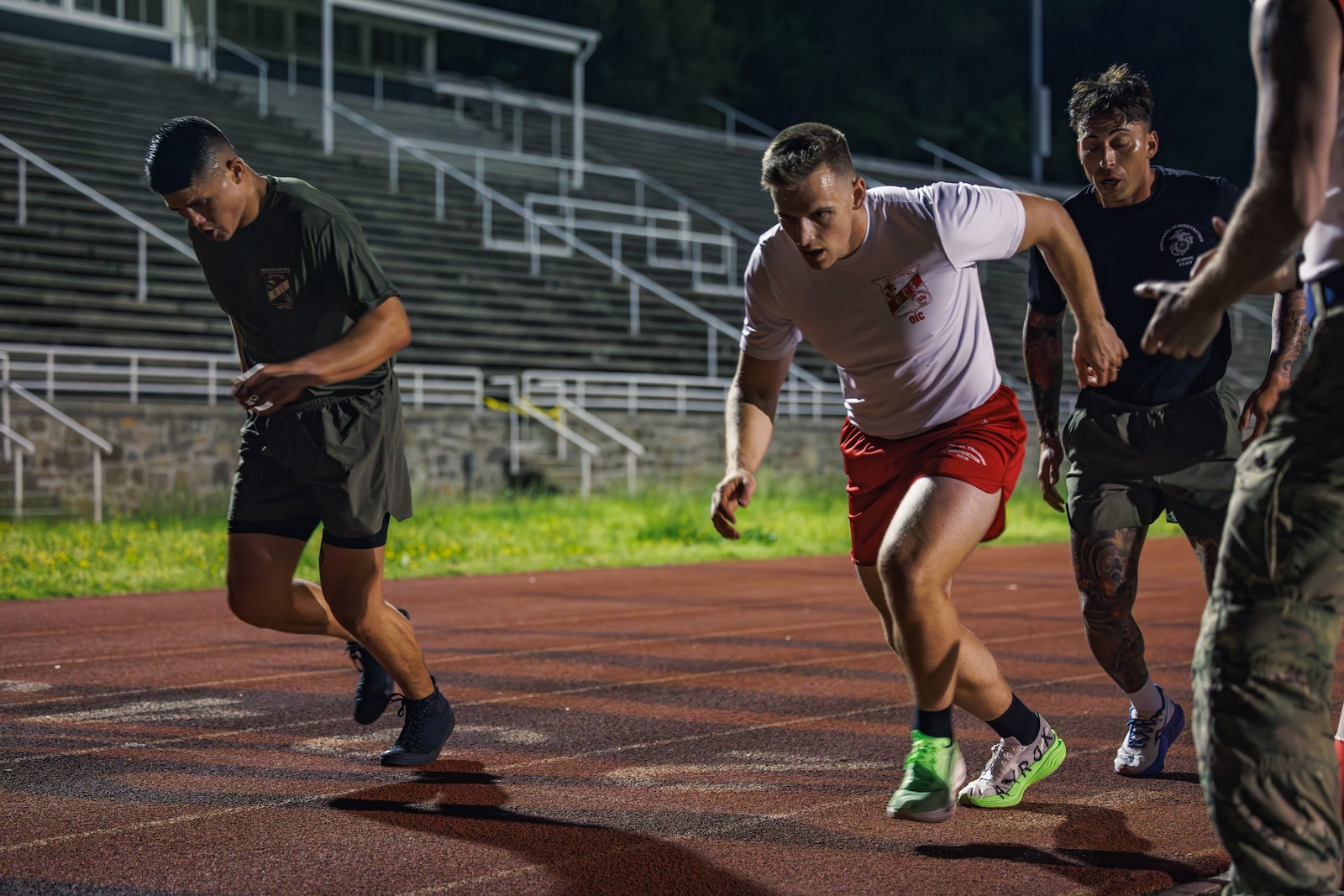 U.S. Marines conduct the “Beep Test” event during the Fittest Instructor Competition at Butler Stadium on Marine Corps Base Quantico, Virginia, April 26, 2025. The Fittest Instructor Competition brought together instructors from across the Marine Corps to go head-to-head in a series of demanding physical challenges-all to determine who truly earns the title of the fittest instructor. (U.S. Marine Corps photo by Lance Cpl. Braydon Rogers)
