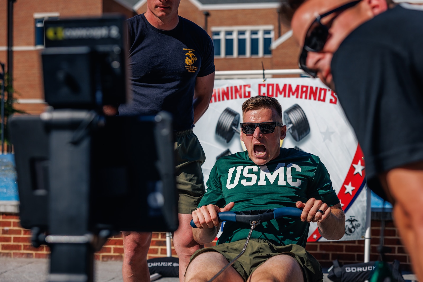 U.S. Marine Corps Capt. Justin Vetterl, a company executive officer with Officer Candidate School, H Company, conducts the “Row Well, and Live” event during the Fittest Instructor Competition at Marine Corps University on Marine Corps Base Quantico, Virginia, April 28, 2025. The Fittest Instructor Competition brought together instructors from across the Marine Corps to go head-to-head in a series of demanding physical challenges-all to determine who truly earns the title of the fittest instructor. (U.S. Marine Corps photo by Lance Cpl. Braydon Rogers)