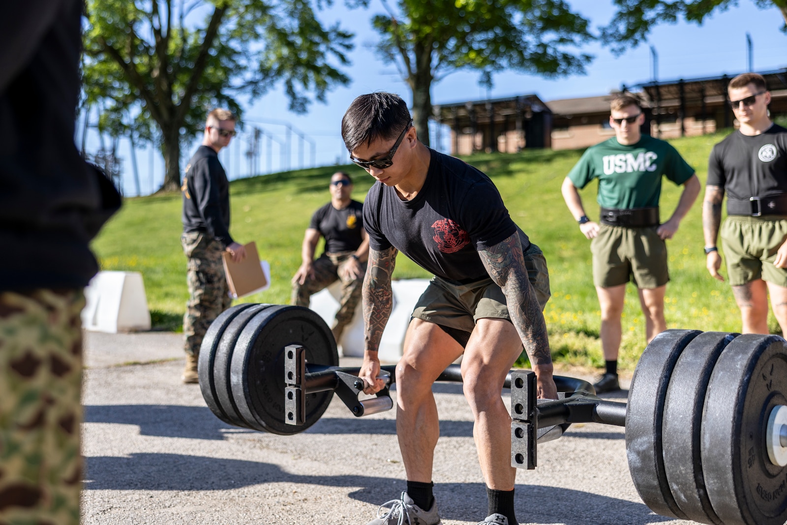 U.S. Marine Corps Staff Sgt. Theophilus Pilette, a squad instructor with the School of Infantry East, performs a deadlift during the Training Command’s Fittest Instructor Competition on Marine Corps Base Quantico, Virginia, April 28, 2025. The Fittest Instructor Competition determines which Marine is the most fit across the major support elements of Training Command while supplementing those competitors with increased education in aerobics, nutrition, and exercise.  (U.S. Marine Corps photo by James Frank)