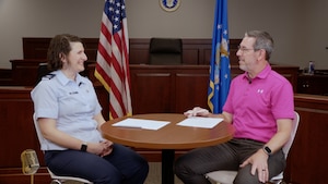 two people sitting at a table