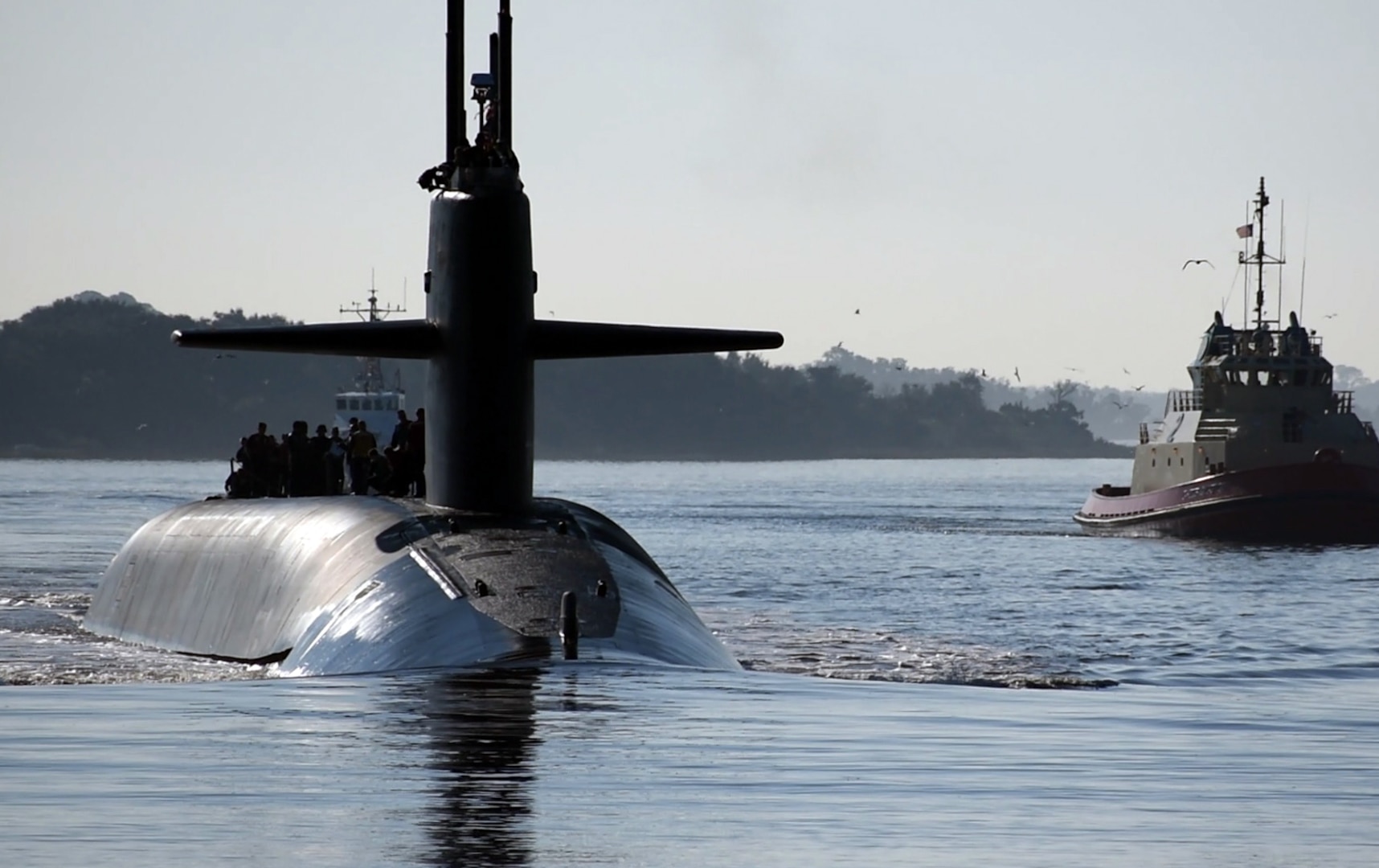 The Ohio-class ballistic-missile submarine USS Maryland (SSBN 738) gold crew returns to its homeport at Naval Submarine Base Kings Bay, Ga., following a strategic deterrence patrol. The boat is one of five ballistic-missile submarines stationed at the base and is capable of carrying up to 20 submarine-launched ballistic missiles with multiple warheads. (U.S. Navy photo by Mass Communication Specialist 2nd Class Bryan Tomforde)
