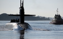 The Ohio-class ballistic-missile submarine USS Maryland (SSBN 738) gold crew returns to its homeport at Naval Submarine Base Kings Bay, Ga., following a strategic deterrence patrol. The boat is one of five ballistic-missile submarines stationed at the base and is capable of carrying up to 20 submarine-launched ballistic missiles with multiple warheads. (U.S. Navy photo by Mass Communication Specialist 2nd Class Bryan Tomforde)