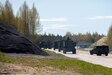 Estonian soldiers drive multiple M142 High Mobility Artillery Rocket Systems (HIMARS) off the airfield at Amari Air Base, Estonia, April 29, 2025. In 2022, the U.S. State Department approved HIMARS sales to Estonia, which have now been received. Their arrival will give Estonia precise long-range artillery capabilities to strike deep behind enemy lines. (U.S. Army photo by Pfc. Jaidyn Moore)