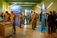 U.S. service members and other attendees explore the new exhibit titled “Message Follows” following its opening at the Latvian War Museum in Riga, Latvia, April 11, 2025. The exhibit showcases video interviews, uniforms, equipment, and personal belongings of U.S. Army soldiers who served alongside Latvian troops during the War in Afghanistan. The U.S.-Latvia military partnership, which began in 1993, continues today with the presence of V Corps, the U.S. Army’s only forward-deployed corps in Europe. The enduring presence of V Corps enables continuity and readiness in an ever-evolving environment while supporting the NATO mission. (U.S. Army photo by Spc. Rachel Hall)