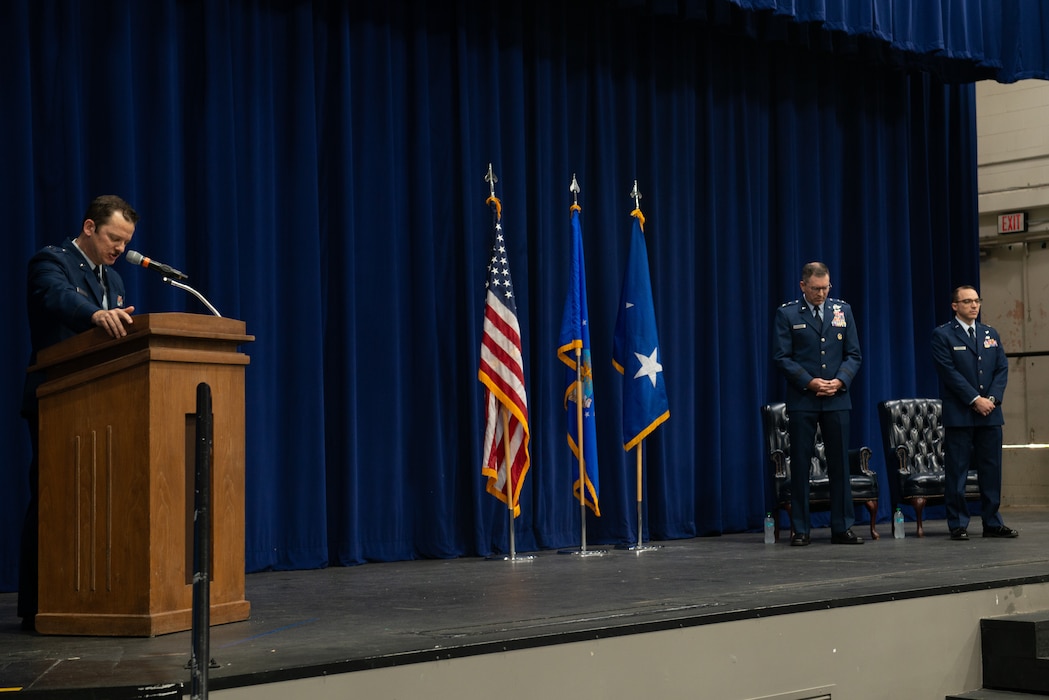 People standing on a stage.