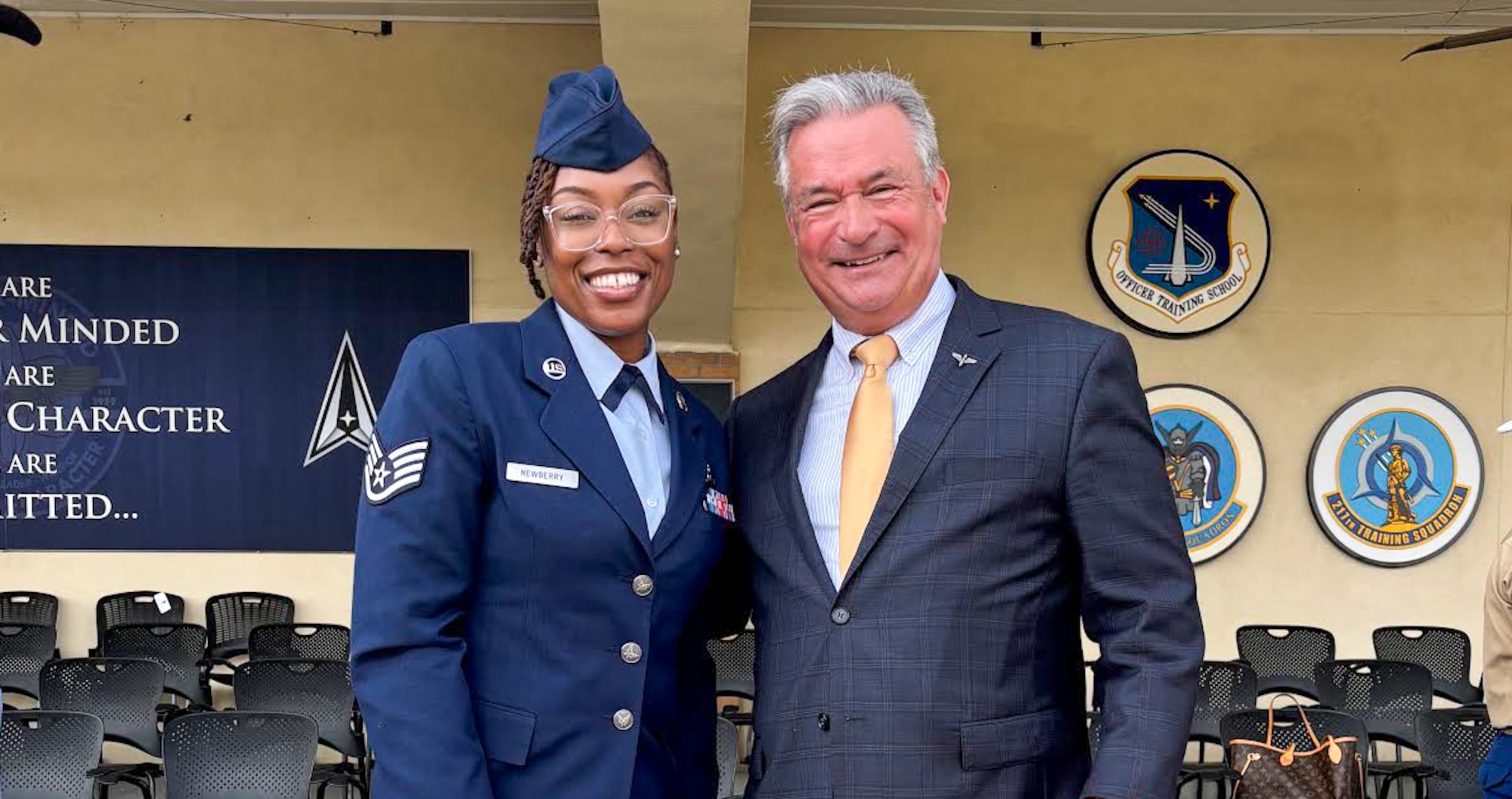 U.S. Congressman Don Bacon and U.S. Air Force Staff Sgt. Jamilla Newberry, Holm Center protocol noncommissioned officer in charge, pose for a photo at Maxwell Air Force Base, Alabama, April 25, 2025.
