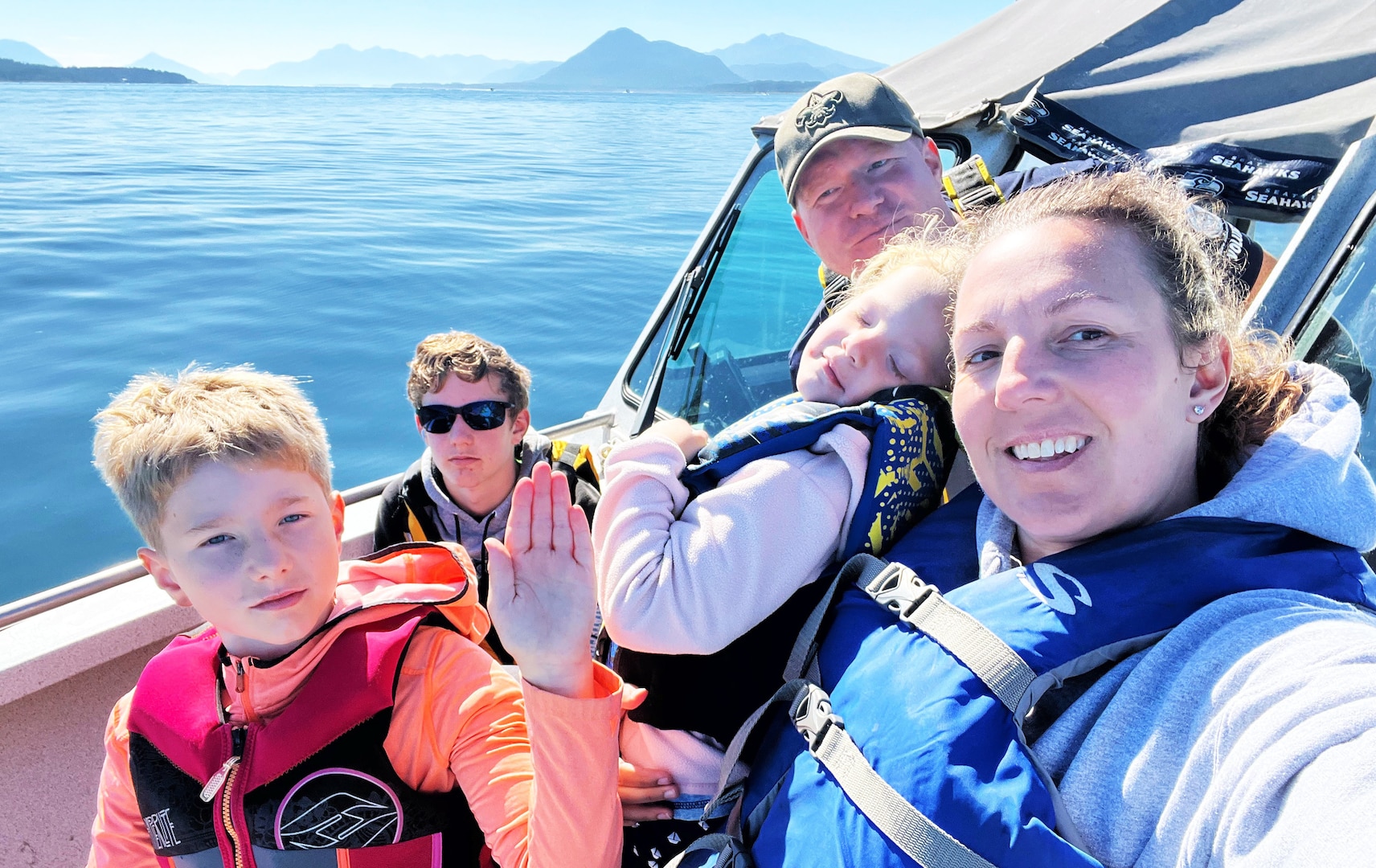 Morgan Holden, the Coast Guard’s 2024 Ombudsman of the Year, enjoys a day on the water with her family.
