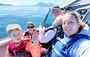 Morgan Holden, the Coast Guard’s 2024 Ombudsman of the Year, enjoys a day on the water with her family.