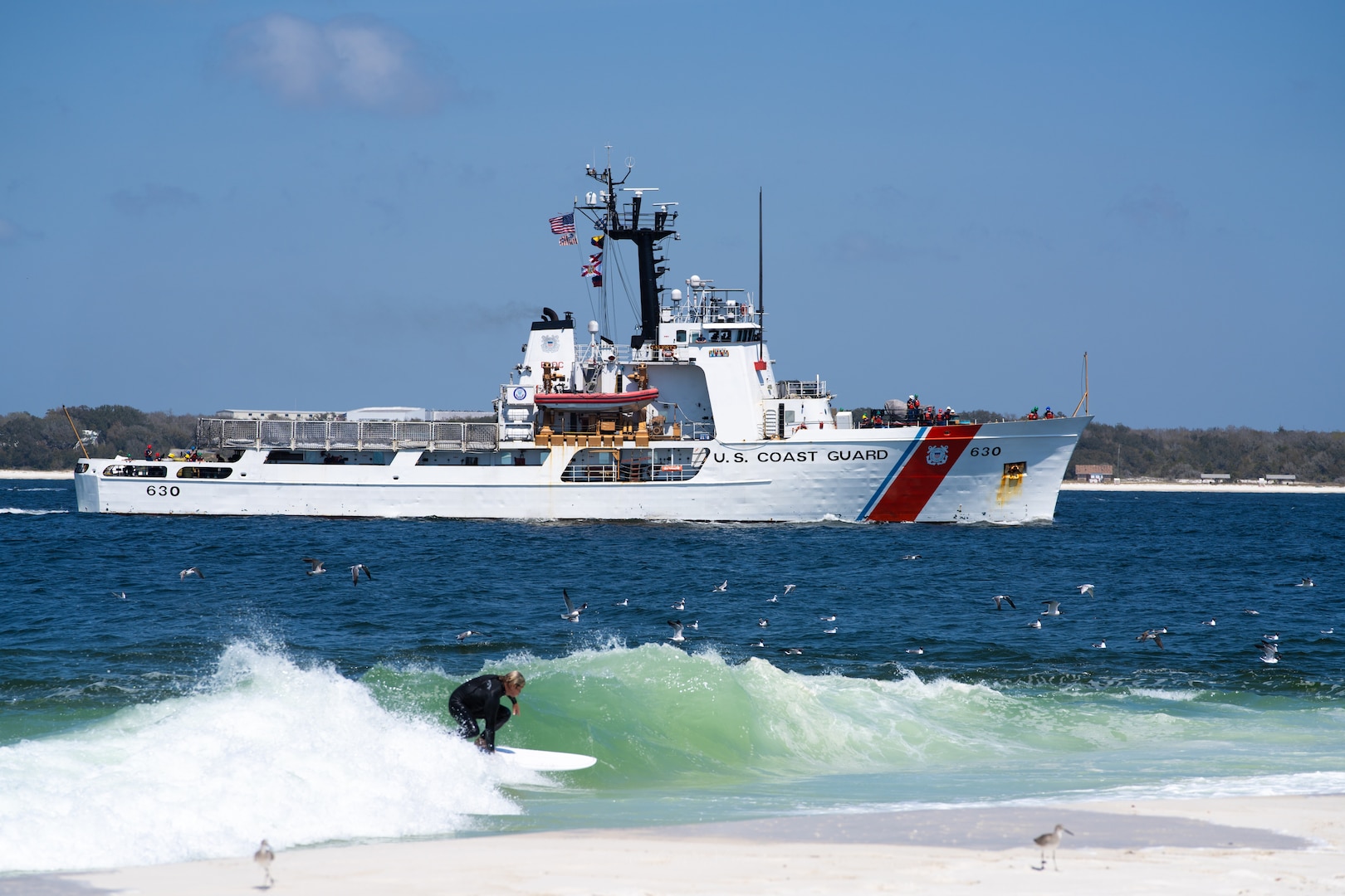 Coast Guard Cutter Alert (WMEC 630) approaches Naval Air Station Pensacola in Florida, March 28, 2025. Alert’s crew conducted a 55-day maritime border security patrol to counter illegal fishing in the Gulf of America. (Copyright-free photo courtesy of Shane Dye)