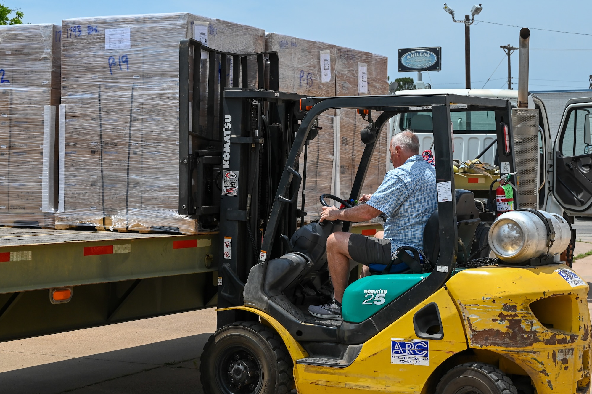Mike Murphy, Global Samaritan Resources director of logistics, loads a truck with food supplies for the Denton Program in Abilene, Texas, April 28, 2025. Murphy has worked with Global Samaritan Resources for 7 years to help collect surplus goods and share with people in need. (U.S. Air Force photo by Airman 1st Class Adrien Tran)