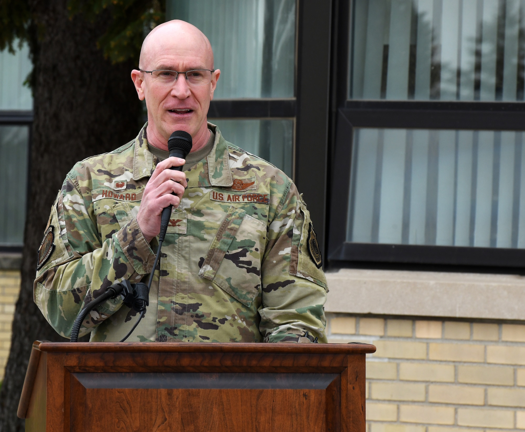 Airman gives speech in front of the SAC Heritage Law Center