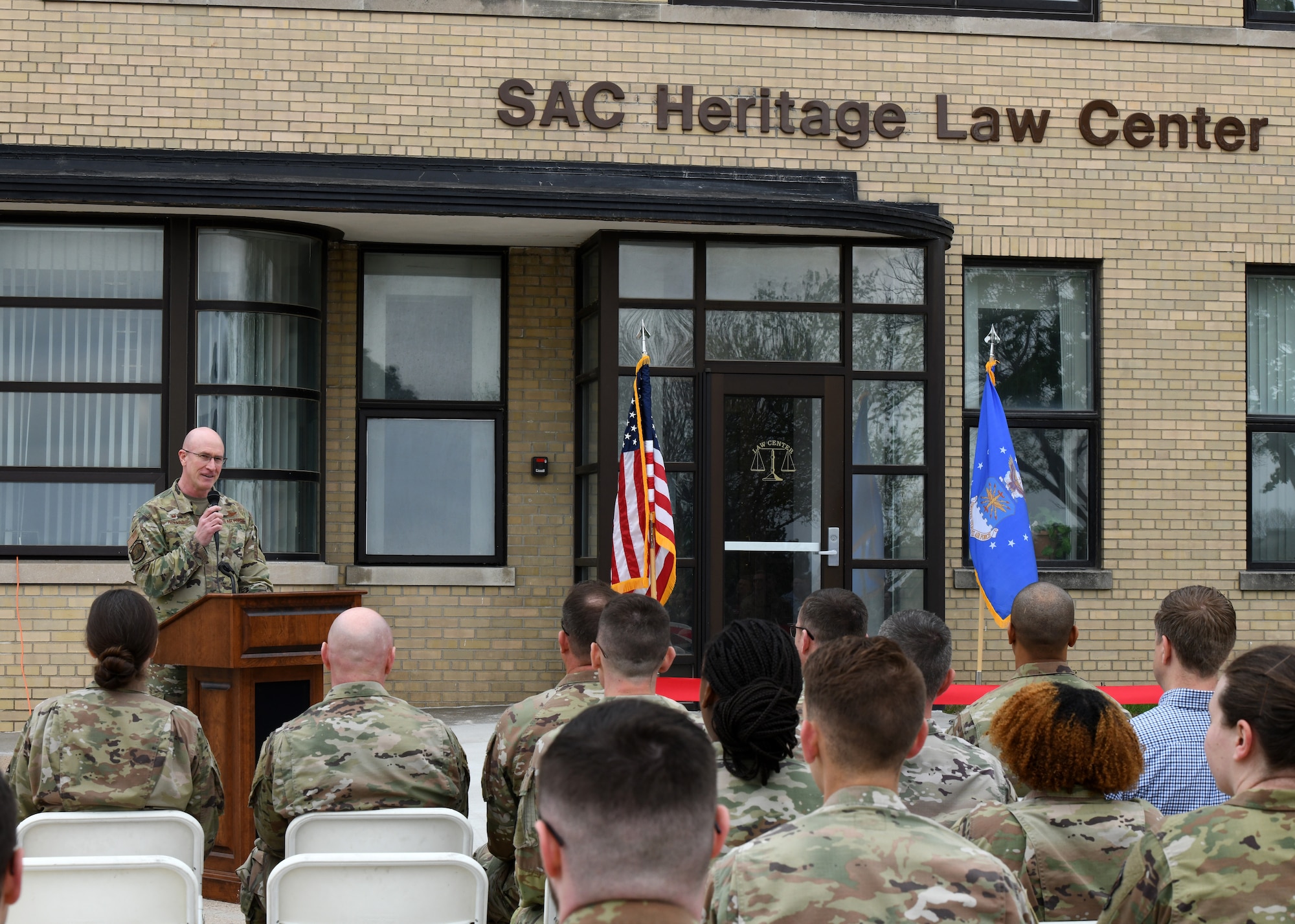 Airman gives speech in front of the SAC Heritage Law Center