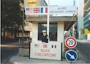 young Sgt. 1st Class Michael Rafferty, standing watch near the Berlin Wall