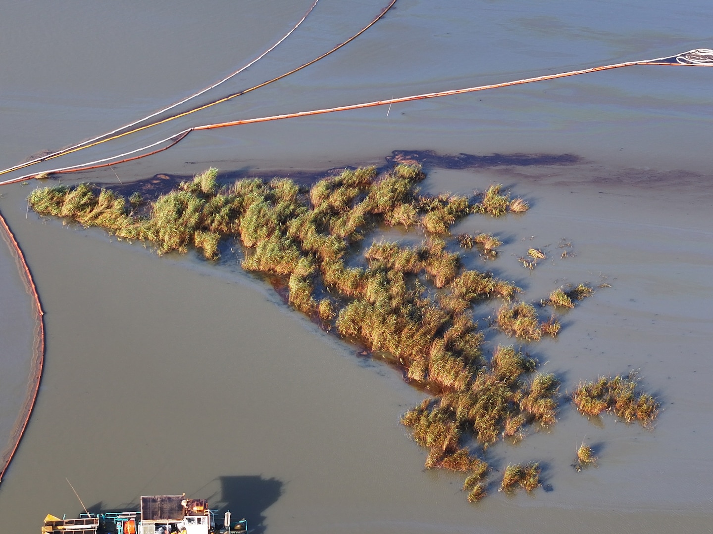 An overflight displays the affected area of marsh environment near Garden Island Bay, Louisiana on May 2, 2025. A safety zone has been enacted in the area and boom has been placed to contain the released product. (U.S. Coast Guard courtesy photo)