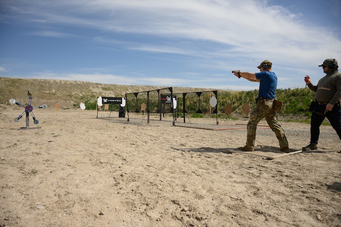 Senior Airman Tomas Read, 75th Security Forces Squadron, competes in the 2025 Law Enforcement Handgun Competition April 15, 2025 at the Big Salty Range, Salt Lake City, UtahThe competition fostered collaboration among agencies and provided an opportunity for participants to test their skills against counterparts from across the country. (U.S. Air Force photo by R. Nial Bradshaw)
