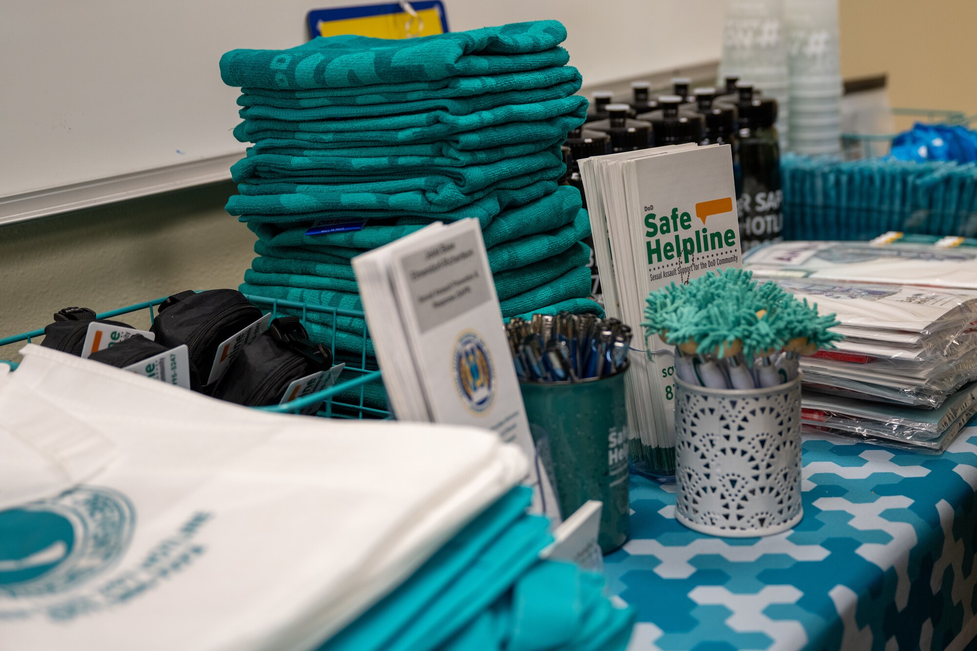 Sexual Assault Prevention and Response-themed souveniers are displayed on a table during a Sexual Assault Awareness and Prevention Month open house at Joint Base Elmendorf-Richardson, Alaska, April 3.